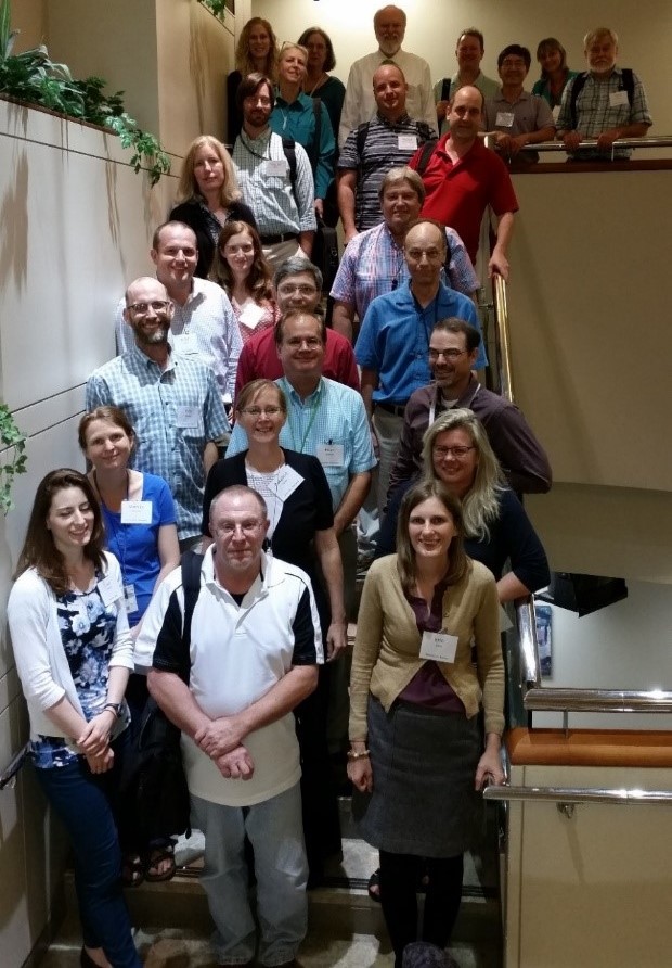 26 members of the AGR working group pose on the stairs of the USDA George Washington Carver Center